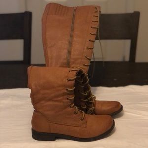 Women's tan leather boots.